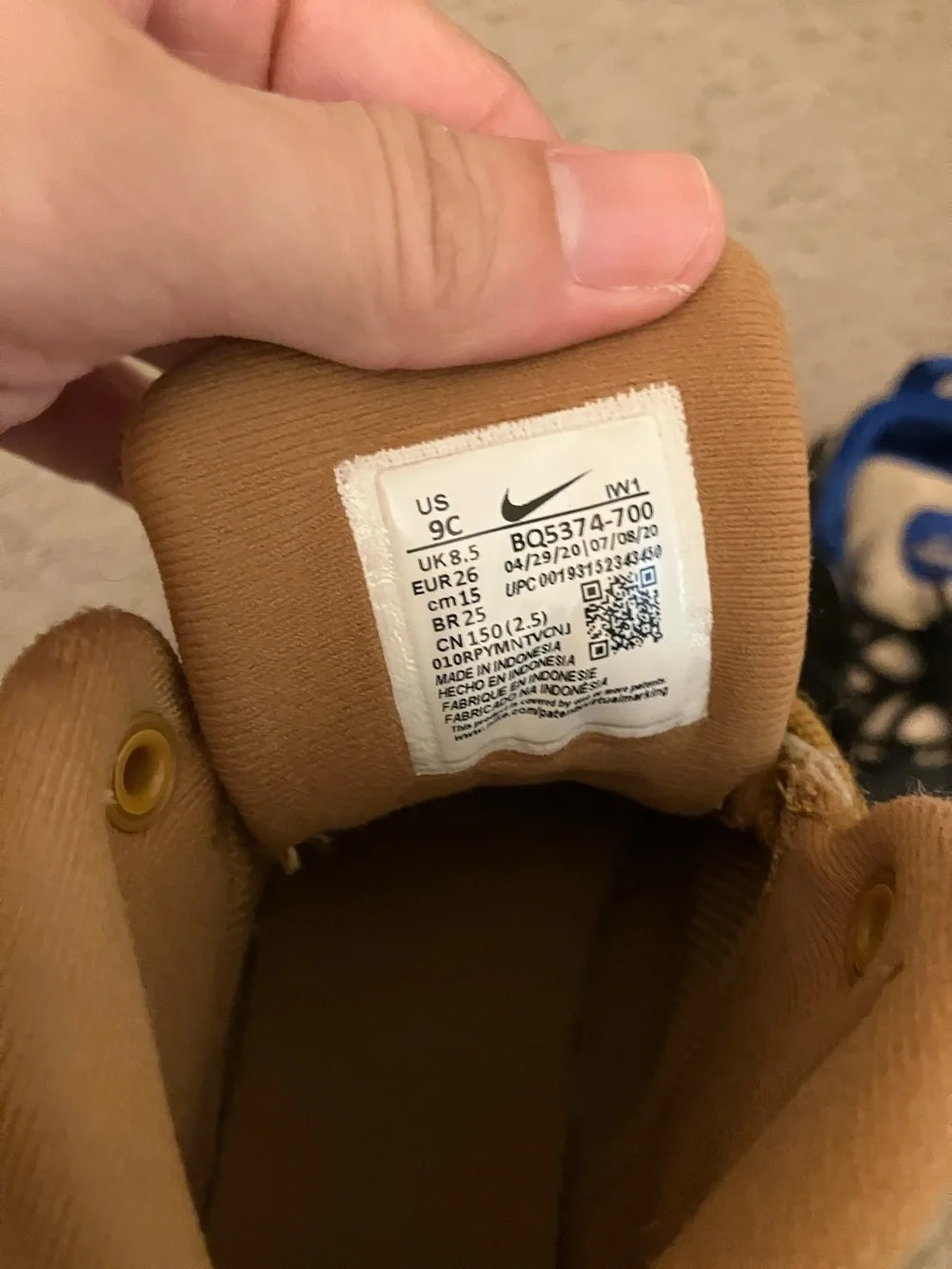 Both Nike Kids Black and tan High-Top Boots